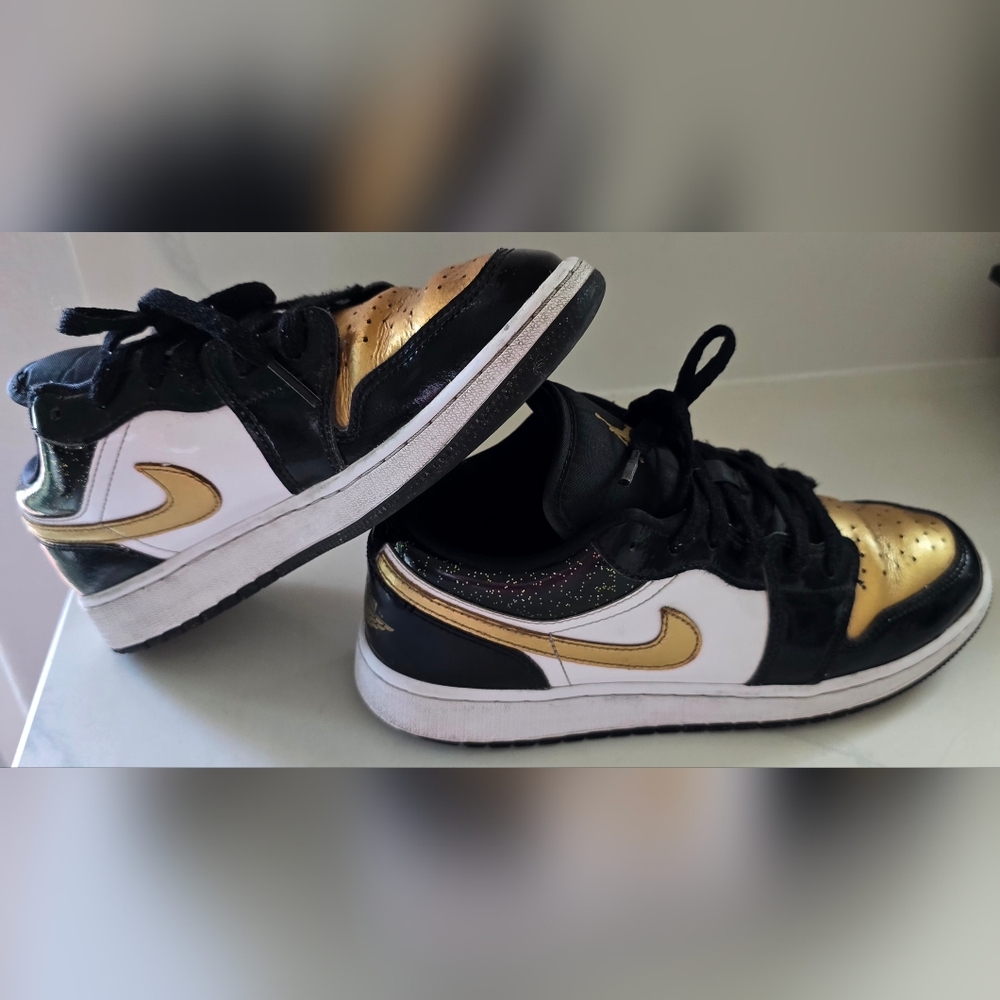 Nike Air Jordan’s 1 low Black Gold White 6.5Y / 8 women